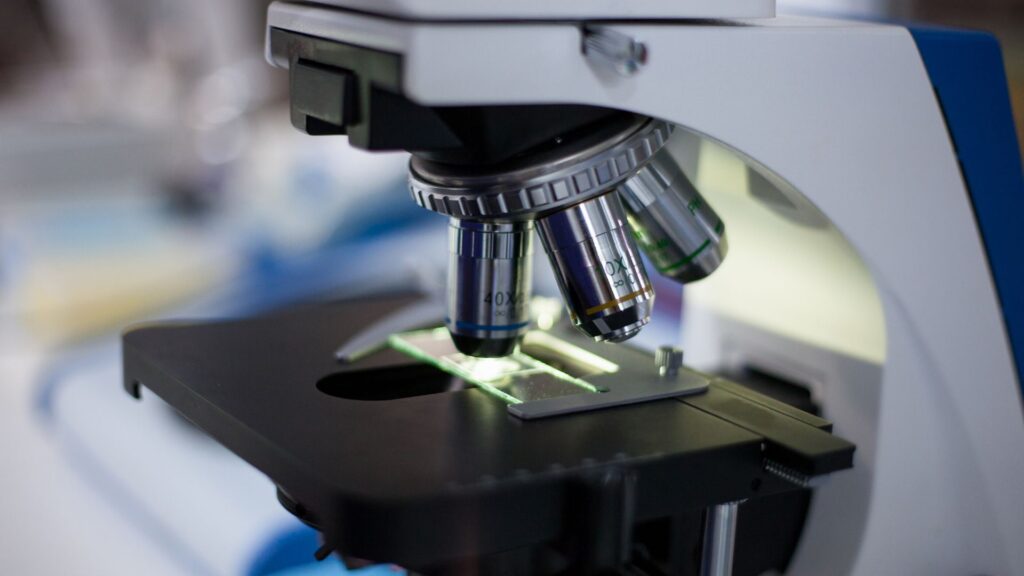 Microscope examining a sample