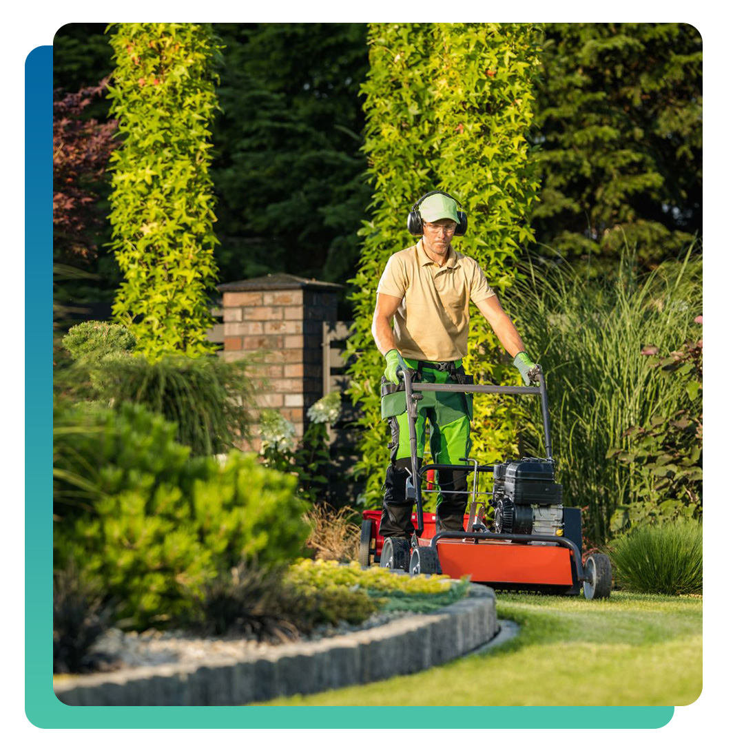 Man on stand on lawn lower